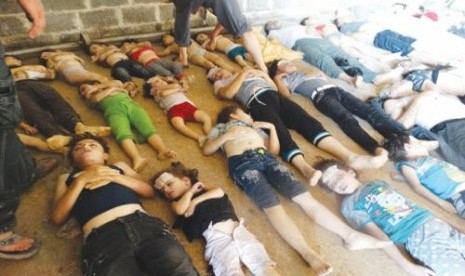 Jasad korban serangan senjata kimia di Ghouta, Suriah, Rabu (21/8). 