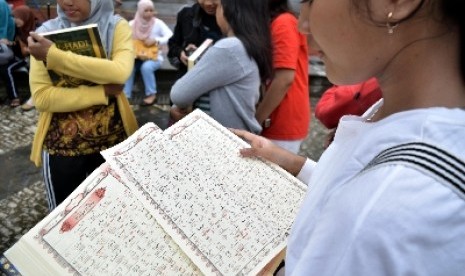Pengenalan baca Alquran di Bundaran HI HI, Jakarta Pusat, Ahad (4/12).