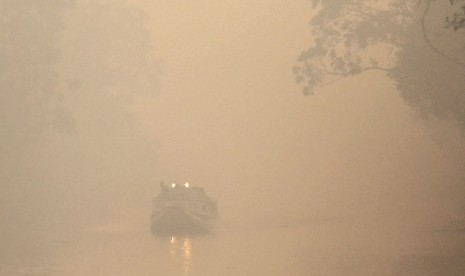 Sungai Air Sugihan Ogan Komering Ilir (OKI), Sumsel, Rabu (7/9), tertutup kabut asap.