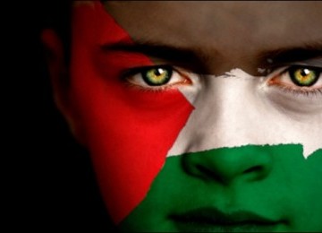 bocah-dengan-lukisan-bendera-palestina-di-wajahnya-_110629121535-519.jpg