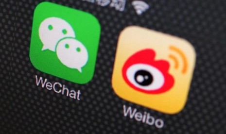 Lawan Dominasi Alipay, WeChat Pay Minta Bantuan Visa hingga MasterCard. (FOTO: REUTERS/Petar Kujundzic)