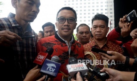 Mantan Menteri Pemuda dan Olahraga Imam Nahrawi bersiap untuk menjalani pemeriksaan di Gedung KPK Jakarta, Jumat, (27/9).