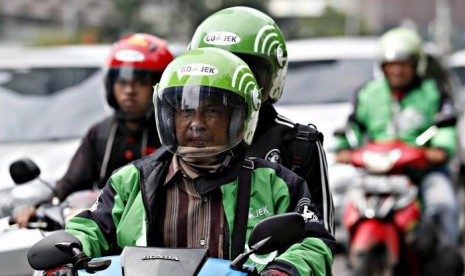 Setelah Mitsubishi dan Bank Thailand, Go-Jek Kedatangan Investor Baru. (FOTO: Reuters/Darren Whiteside)