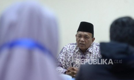 Imbas Pengesahan RUU PIHU. Ketua Komisi Pengawasan Haji Indonesia (KPHI) Samidin Nashir menyampaikan paparan di kantor KPHI, Jakarta, Jumat (5/4/2019).