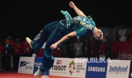 Penampilan Atlet Wushu Indonesia Edgar Xavier Marvelo dalam pertandingan  Wushu Men's Chanquan Asian Games 2018 di Jie Expo Kemayoran, Jakarta, Minggu (19/8).