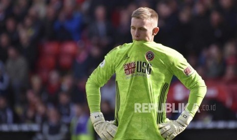 Ekspresi kekecewaan kiper Sheffield United,  Dean Henderson pada laga Liga Primer Inggris melawan Liverpool di Stadion Bramall Lane, Sabtu (28/9) WIB.