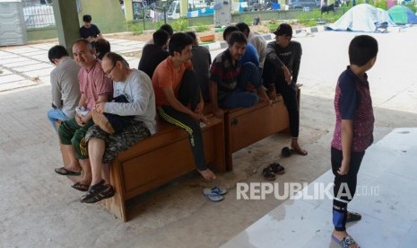 Pencari Suaka beraktifitas di lahan eks Kodim, Perumahan Daan Mogot Baru, Jakarta Barat, Senin (2/9/2019).