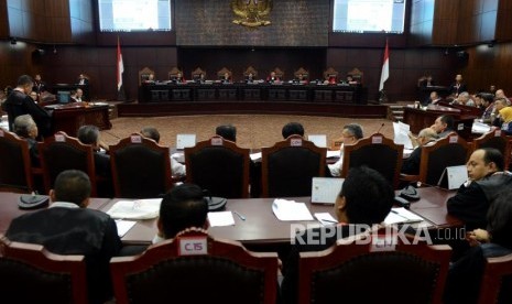 Suasana sidang perdana perselisihan hasil pemilihan umum (PHPU) pemilihan presiden (pilpres) 2019 di gedung Mahkamah Konstitusi, Jakarta, Jumat (14/6).