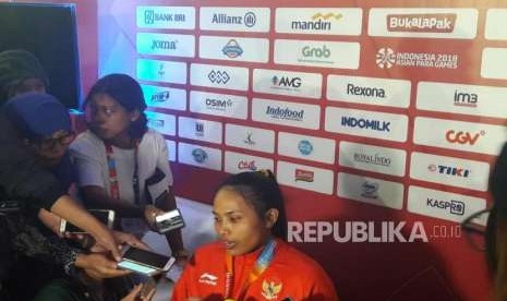 Paralifter Indonesia Ni Nengah Widiasih meraih medali perak pada nomor angkat berat 41 kilogram putri Asian Para Games 2018.