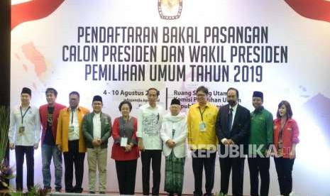 Incumbent President Joko Widodo (Jokowi) and his running mate KH Maruf Amin (central, white shirts).