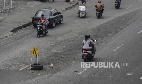 Banjir Jakarta Sebabkan 32 Titik Jalan Rusak.