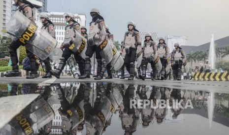 [Ilustrasi] Pengamanan Unjuk Rasa MK. Sejumlah Polisi anti huru hara membubarkan diri usai mengamankan aksi massa yang berunjuk rasa mengawal sidang perdana Perselisihan Hasil Pemilihan Umum (PHPU) sengketa pemilihan Presiden 2019 di Mahkamah Konstitusi, Jakarta Pusat, Jum’at (14/6).