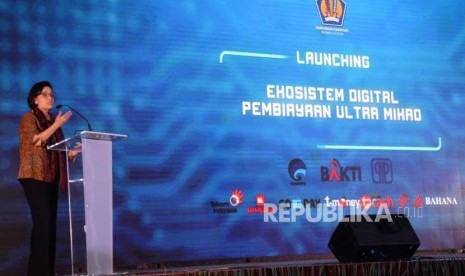 Menkeu Sri Mulyani Indrawati memberikan sambutan pada Launching Ekosistem Digital Pembiayaan Ultra Mikro (UMi) di Kantor Kementerian Keungaan, Jakarta, Selasa (11/12).