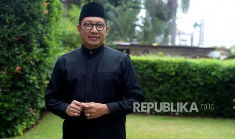 Menteri Agama RI,  Lukman Hakim Saifuddin saat  sesi foto bersama Republika di Jakarta, Sabtu (22/12).