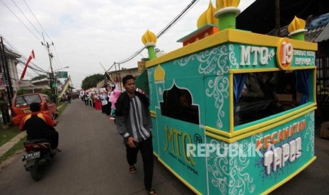 Kafilah Kota Tangerang Raih Medali Emas di MTQ Banten. Peserta Kafilah mengikuti Pawai taaruf Musabaqah Tilawatil Quran (MTQ). Ilustrasi