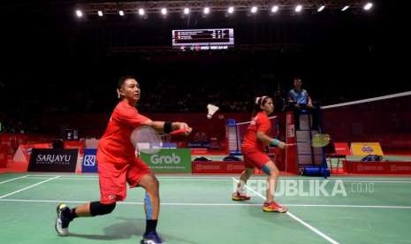 Pebulu tangkis Indonesia Leani Ratri Oktila dan Hary Susanto (ilustrasi).