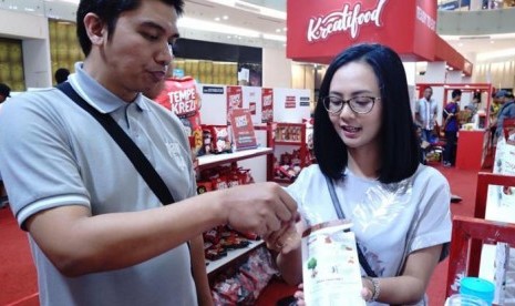 TomaTomi Tarik Perhatian Pengunjung Food Startup Indonesia, Siapa Dia?. (FOTO: Bekraf)