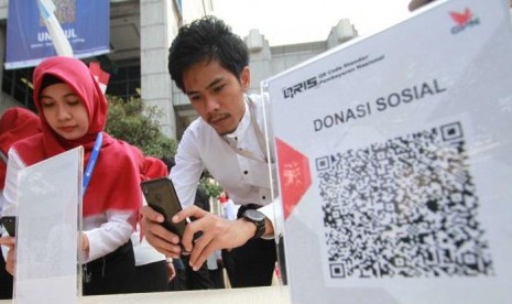 Punya Standar QR Code, Kini Bayar Nontunai Makin Mudah. (FOTO: Sufri Yuliardi)