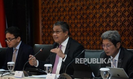 Bank Indonesia (BI): Gubernur Bank Indonesia (BI) Perry Warjiyo menyampaikan pemaparan hasil Rapat Dewan Gubernur (RDG) Bank Indonesia di Bank Indonesia, Jakarta, Kamis (21/2).