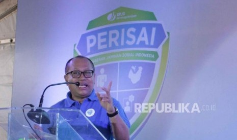 Direktur Utama BPJS Ketenagakerjaan Agus Susanto berikan sambutan saat peluncuran Penggerak Jaminan Sosial Indonesia (PERISAI) di Pasar Seni Sukawati, Gianyar, Bali, Senin (5/2).