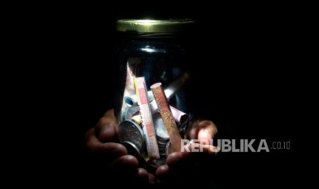 Apakah Boleh Membayar Zakat Kepada Pelajar Dhuafa?. Foto: Ilustrasi Zakat