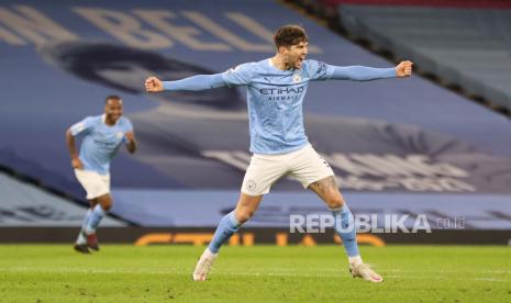 Bek Manchester City John Stones (kanan).