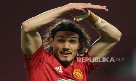 Edinson Cavani dari Manchester United bereaksi selama pertandingan sepak bola Liga Premier Inggris antara Manchester United dan Brighton Hove Albion di Manchester, Inggris, 04 April 2021.