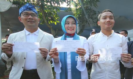 Momen kebersamaan Gubernur Jawa Barat Ridwan Kamil bersama anak sulungnya Emmeril Kahn Mumtadz (Eril). Eril (kanan) hanyut terbawa arus Sungai Aare, Kota Bern, Swiss, pekan lalu.