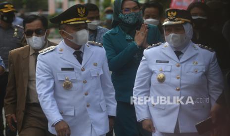 Wali Kota Palu Hadianto Rasyid (kiri) bersama Wakil Wali Kota Palu Reny Lamadjido (kanan)