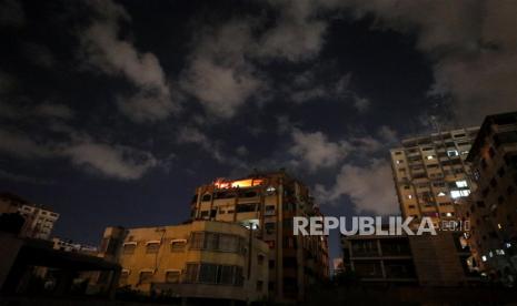 Smoke rises from the house of senior military leader of Islamic Jihad movement Hadi Al Bahtimi after Israeli air strikes in Gaza City, 09 May 2023. Israel carried out several attacks against the military leadership of Islamic Jihad movement in Gaza Strip.  