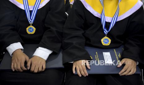 Wisuda anak sekolah (Ilustrasi). Pelepasan peserta didik dinilai perlu sebagai kenangan di masa sekolah.