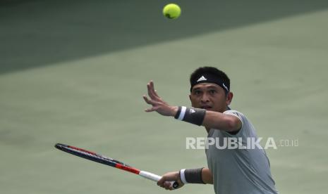 Petenis Indonesia Christopher Rungkat. Christo yang berpasangan dengan Treat Huey asal Filipina memastikan kemenangan pertama pada sektor ganda turnamen Grand Slam Australian Open 2022, Rabu (19/1/2022). 