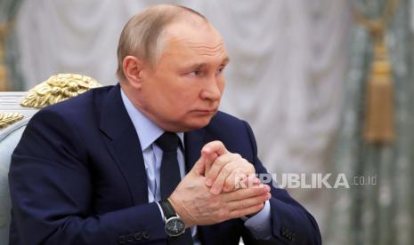 Presiden Rusia Vladimir Putin. Rusia menduga agen-agen CIA memprovokasi Ukraina untuk membunuh jurnalis Rusia. 