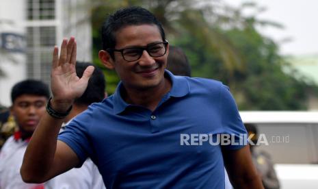 Menteri Pariwisata dan Ekonomi Kreatif Sandiaga Uno. Sandi mengaku sempat menerima pesan singkat dari Mensesneg sebelum dipanggi ke Istana Negara untuk diberi amanah sebagai Menparekraf.