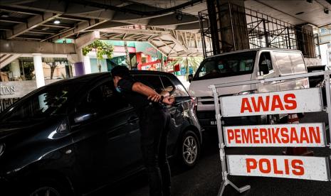 Malaysia melaporkan penambahan 21.468 pasien baru Covid-19 dalam 24 jam terakhir.