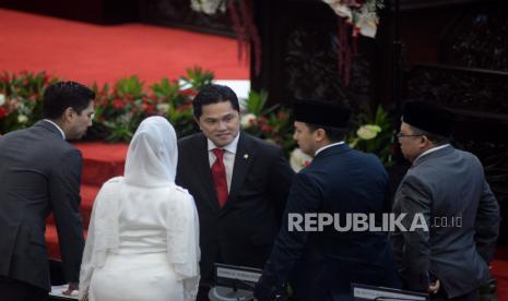 Menteri BUMN Erick Thohir berbincang saat menghadiri Sidang Tahunan MPR.