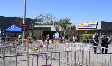 Pandangan umum masuk ke South Western Sydney Vaccination Centre, di Macquarie Fields di Sydney, New South Wales, Australia, 24 September 2021. 