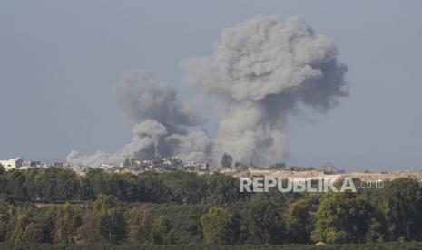 Smoke rises following an Israeli bombardment in the Gaza Strip, as seen from southern Israel on Monday, Dec. 4, 2023.  