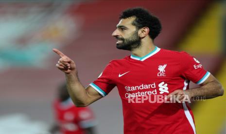 Pemain Liverpool Mohamed Salah melakukan selebrasi setelah mencetak keunggulan 2-1 pada pertandingan sepak bola Liga Premier Inggris antara Liverpool FC dan Sheffield United di Liverpool, Inggris, 24 Oktober 2020.