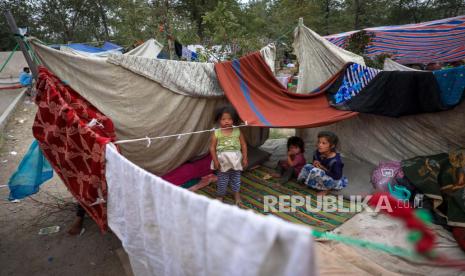 Keluarga pengungsi internal dari provinsi utara, yang melarikan diri dari rumah mereka karena pertempuran antara Taliban dan pasukan keamanan Afghanistan, berlindung di sebuah taman umum di Kabul, Afghanistan, 14 Agustus (dikeluarkan 15 Agustus). 