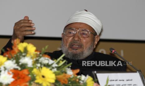  Kenangan UAS Mengikuti Kajian Syekh Yusuf Al Qaradhawi. Foto: Syekh Yusuf al-Qaradawi berbicara dalam konferensi pertama Dialog Nasional di Tripoli 10 Desember 2011.