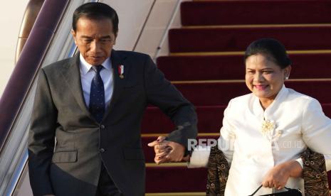 Indonesian President Joko Widodo, left, arrives at Beijing Capital International Airport to attend the third Belt and Road Forum in Beijing, China, Monday, Oct. 16, 2023.  