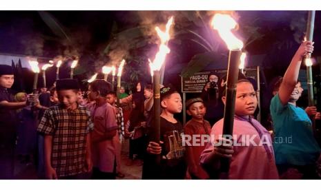 Pawai obor sambut tahun baru hijriyah.