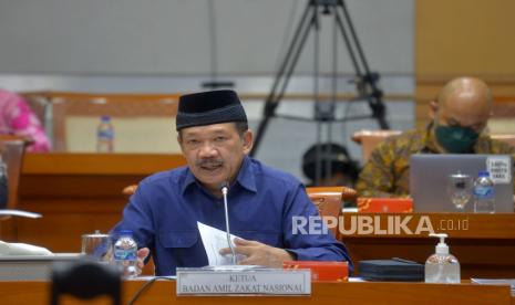 Ketua BAZNAS RI Noor Achmad (kiri) mengikuti rapat dengar pendapat dengan Komisi VIII DPR di Kompleks Parlemen, Senayan, Jakarta, Kamis (16/6/2022). Rapat tersebut membahas evaluasi kinerja dan program tahun 2022.Prayogi/Republika