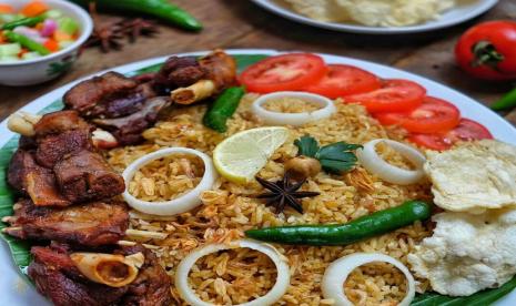 Nasi Kebuli. Nasi kebuli diyakini berasal dari India. Foto: IST