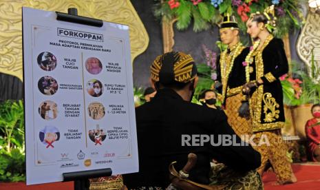 Simulasi resepsi pernikahan di masa pandemi Covid-19. Pemprov DKI Jakarta telah menetapkan 14 ketentuan penyelenggaraan resepsi pernikahan 