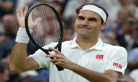 Petenis Swiss Roger Federer saat melakukan selebrasi.