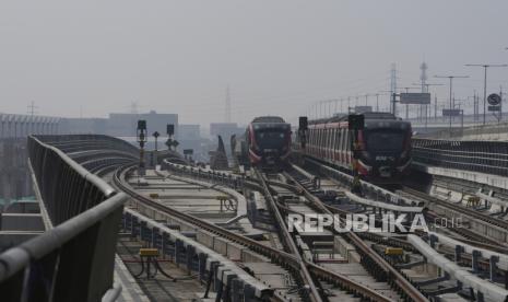 Light Rapid Transit (LRT) trains roll on their tracks during a test run in Bekasi, West Java province, outskirts of Jakarta, Indonesia Thursday, Aug. 10, 2023, ahead of its launch later this month. The 44-kilometer-long (27 miles) light train network is the latest infrastructure improvement in greater Jakarta area that officials hope will help relieve the crippling traffic gridlock in the capital of Southeast Asia’s biggest economy.  