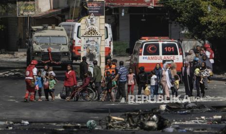 Residents of the Jenin refugee camp fled their homes as the Israeli military pressed ahead with an operation in the area, in Jenin, West Bank, Tuesday, July 4, 2023. Palestinian health officials put the Palestinian death toll from the two-day raid at 10. The Israeli military said Israel launched the operation because some 50 attacks over the past year had emanated from Jenin. 