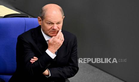 Kanselir Jerman, Olaf Scholz. Jerman merencanakan upaya besar-besaran untuk memperluas jaringan stasiun pengisian kendaraan listrik (EV).